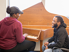 SEU students playing piano