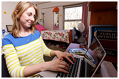 SEU student using a laptop in the dorm