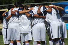 SEU's Eagles varsity soccer team celebrating