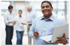 man holding laptop