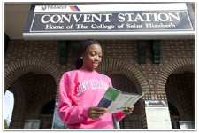 SEU student waiting for train at Convent Station